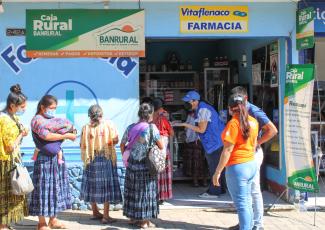 UNHCR accompanying beneficiaries to collect their first cash assistance in San Cristobal Verapaz, Alta Verapaz, Guatemala.