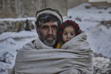 A father and a child in blanket