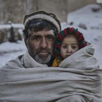A father and a child in blanket