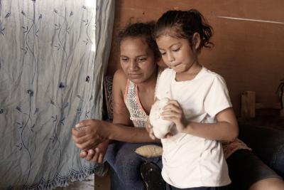 Woman and her daughter. 