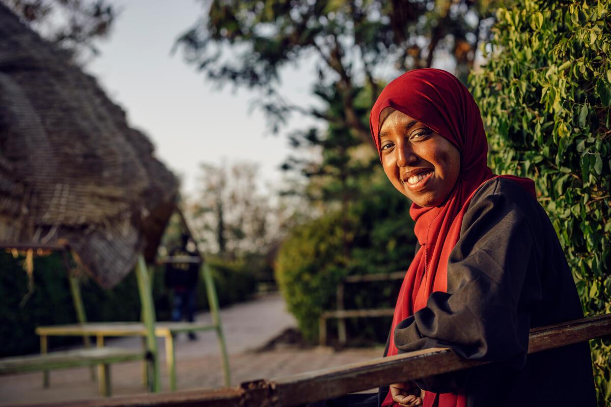 woman standing outside and smiling