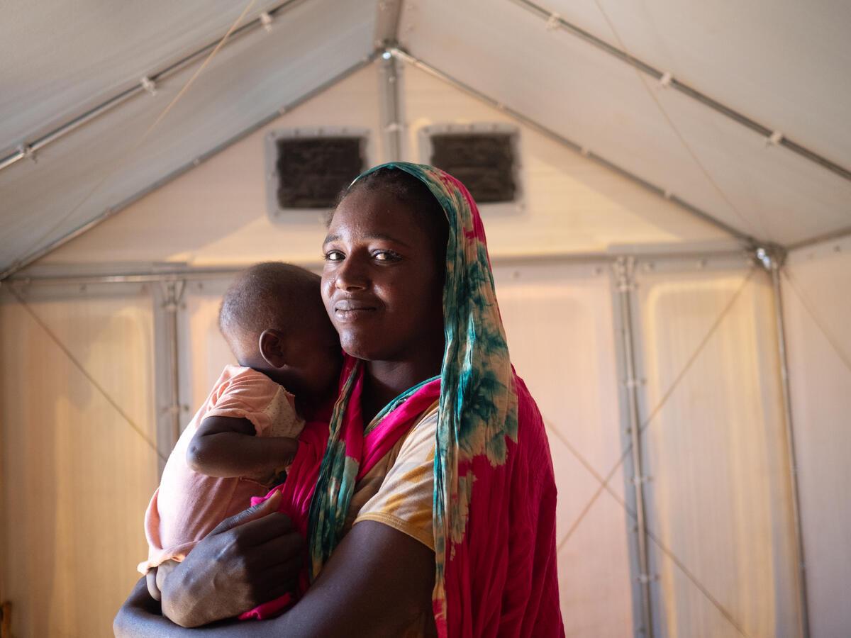 woman holding baby