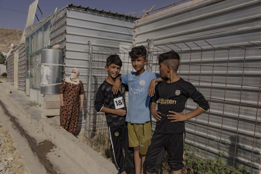 A group of young Yazidis at the Rwanga camp for internally displaced people in the Kurdistan region of Iraq, hosting some 2,440 displaced families. © UNHCR/Andrew McConnell
