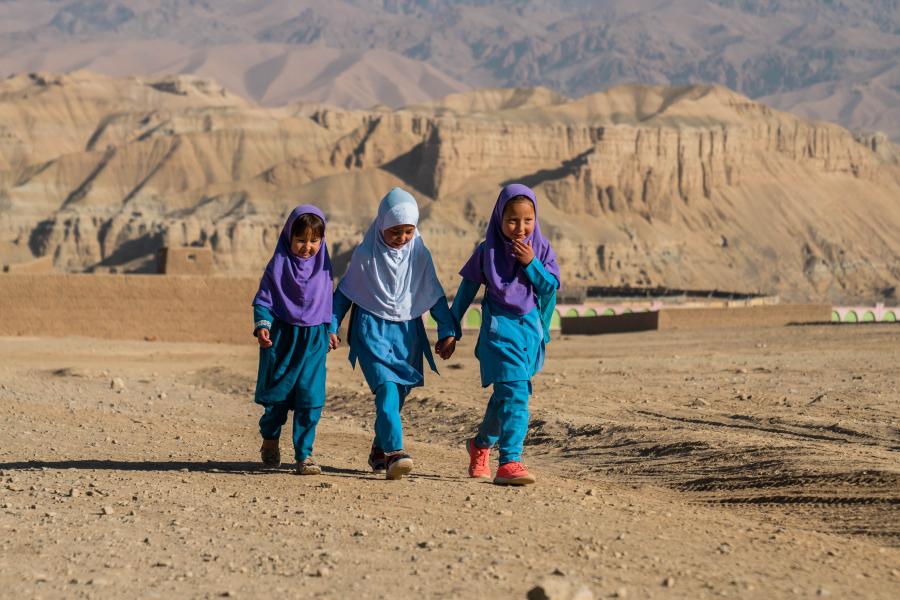 Three girls walking
