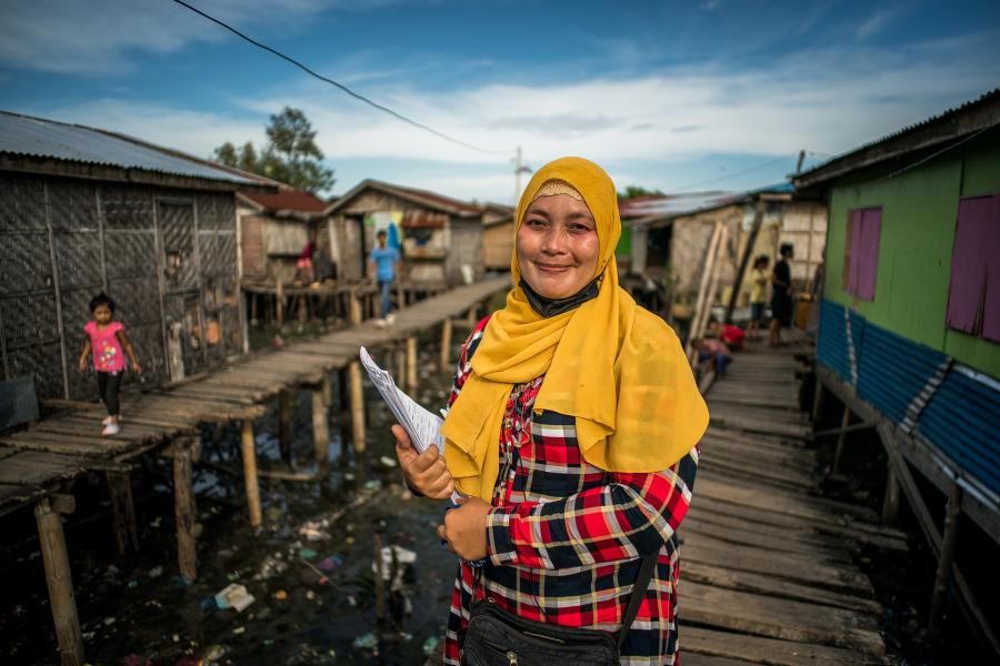 woman holding papers