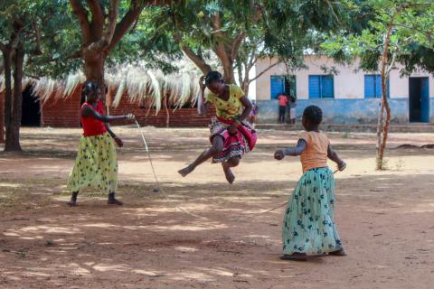 young girls jumping a rope 