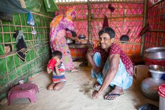 Rohingya refugees Mustafa Kamal, 37, and his wife Monoara, 30, recieve LPG refills in Kutupalong Refugee Camp.