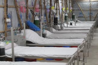 Hospital beds to serve the needs of almost 200 refugees and local community members in Cox's bazaar with severe COVID-19 symptoms .