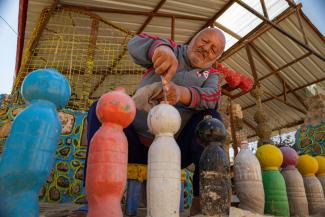 man using plastic for artistic work