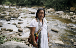 woman next to a river